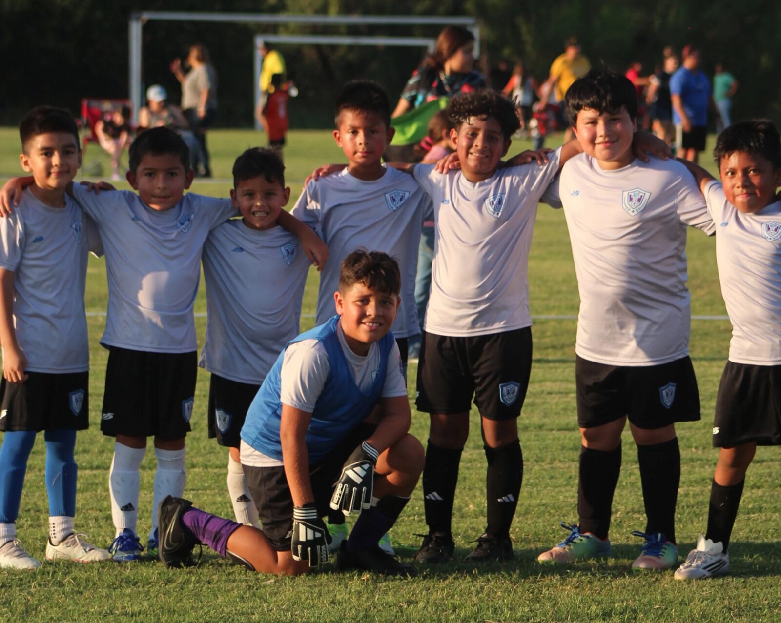 Austin United FC Academy boys and girls on the field